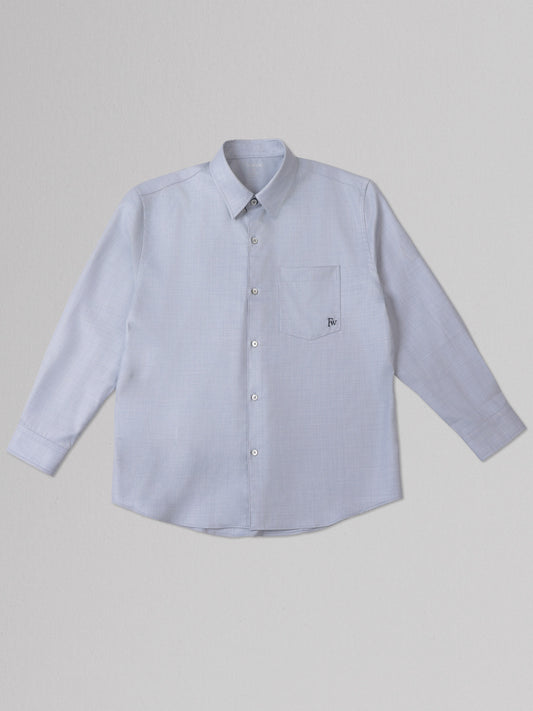 Light blue button-up shirt on a gray background