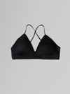 Black bralette on a light gray background