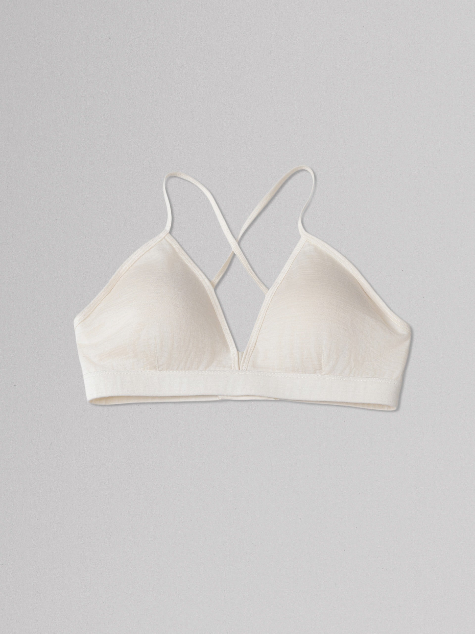 Beige bralette on a gray background